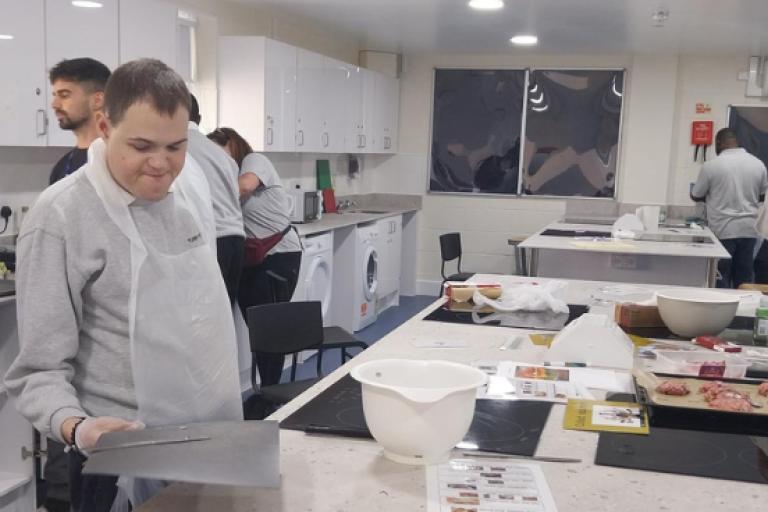 Young adult students take part in classroom activity