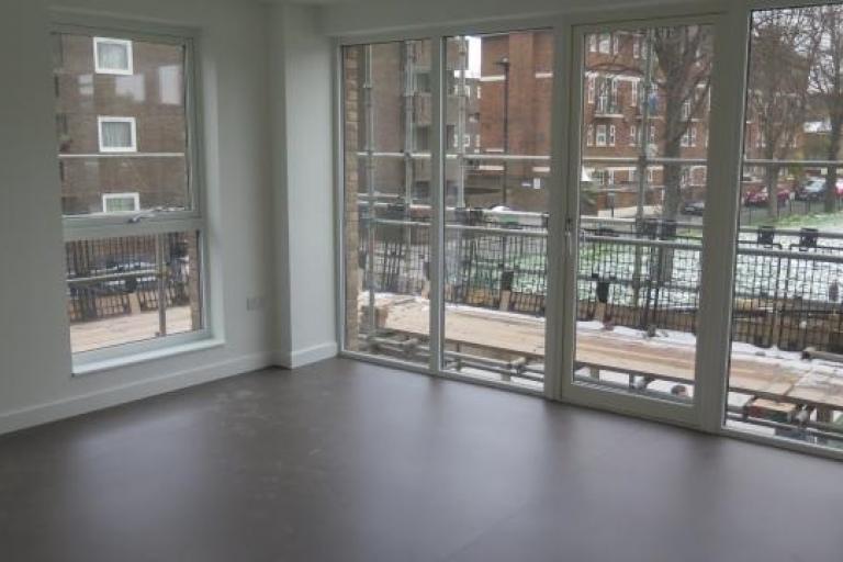 Inside newly constructed flat with a window view 