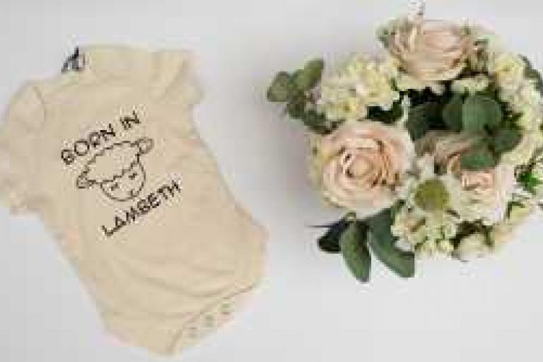 Born in Lambeth lamb bodysuit in natural with flowers