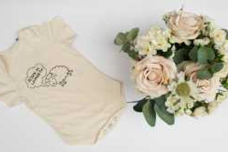 Born in Lambeth sheep bodysuit in natural with flowers
