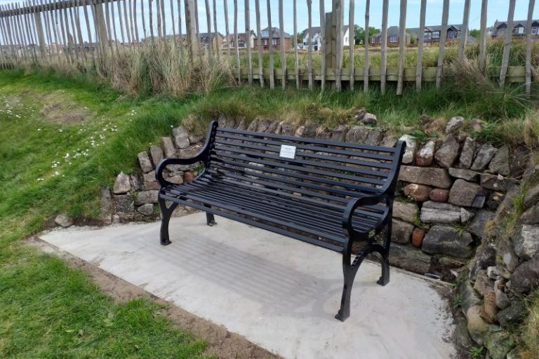 photo of a black KC style memorial bench