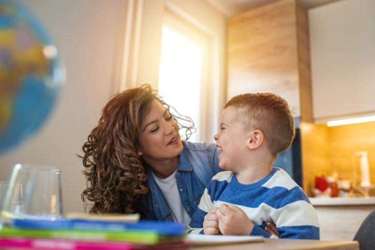 child with parent smiling