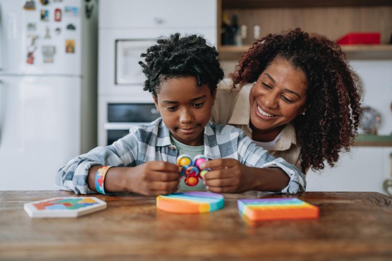 Women with child doing sensory activities