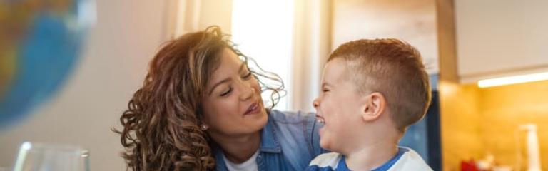 child with parent smiling