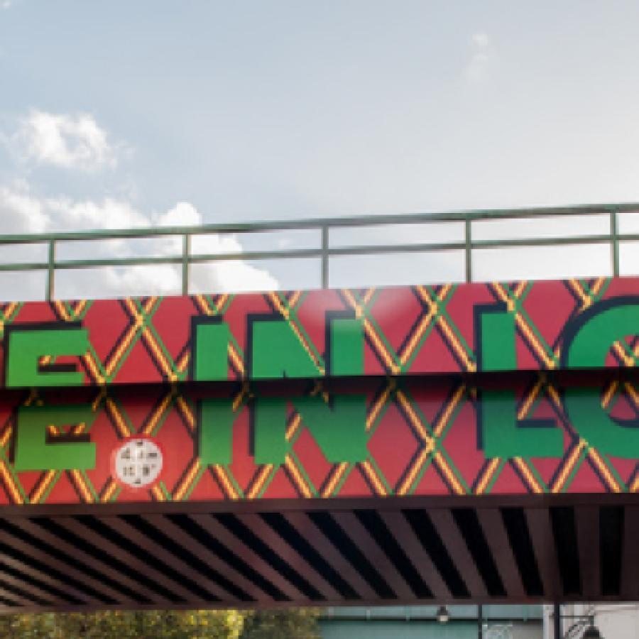 Come in love artwork on Brixton Rail Bridge