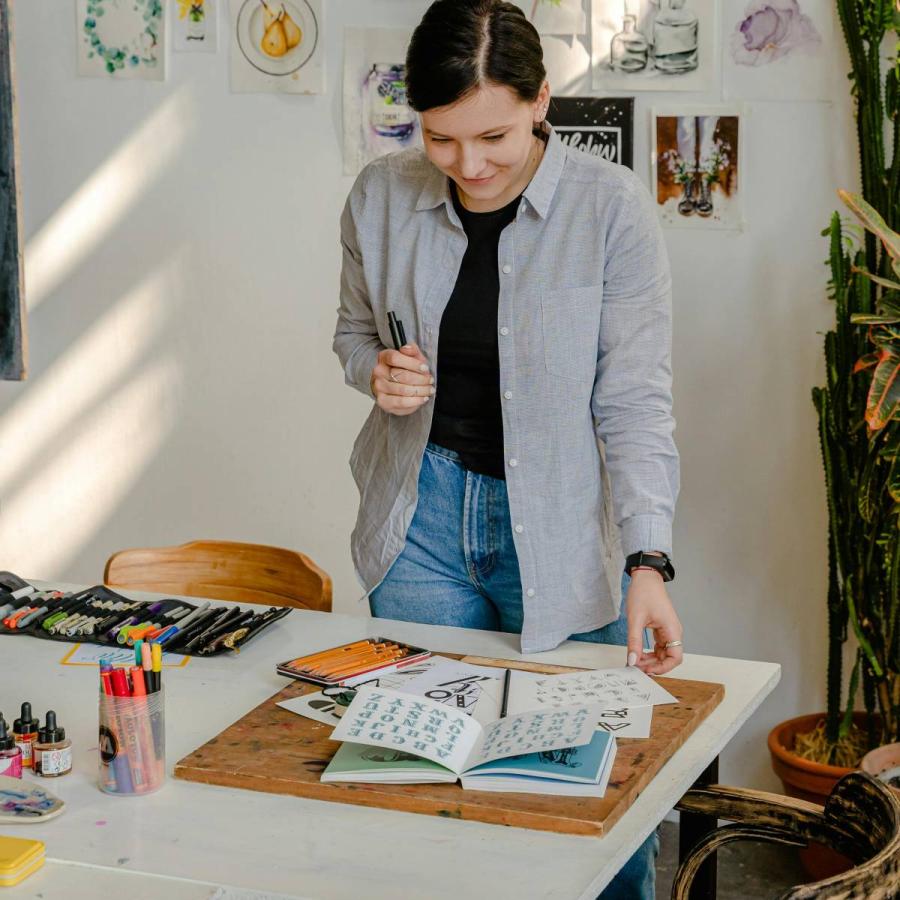 woman making a book and Zine