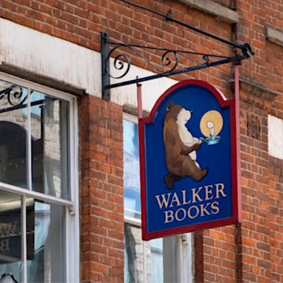 walker books logo - drawing of bear holding a candle