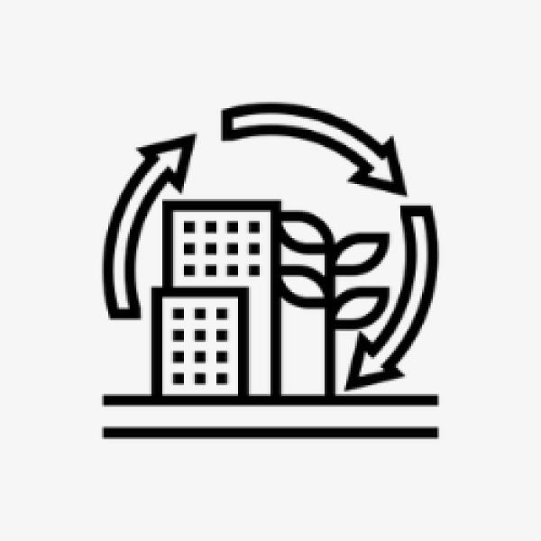 building with tree and circular arrows behind it